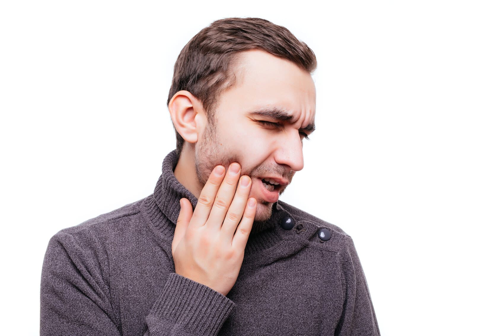 Dentist explaining a tooth extraction plan to a patient at Oasis Smile Dental in NE Calgary